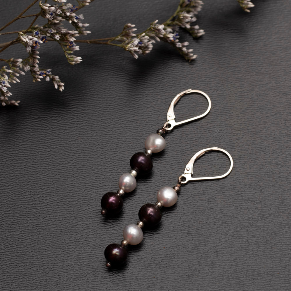 white and plum pearl earrings