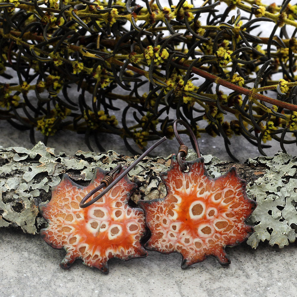 Enamel maple leaf stud earrings in assorted fall colors