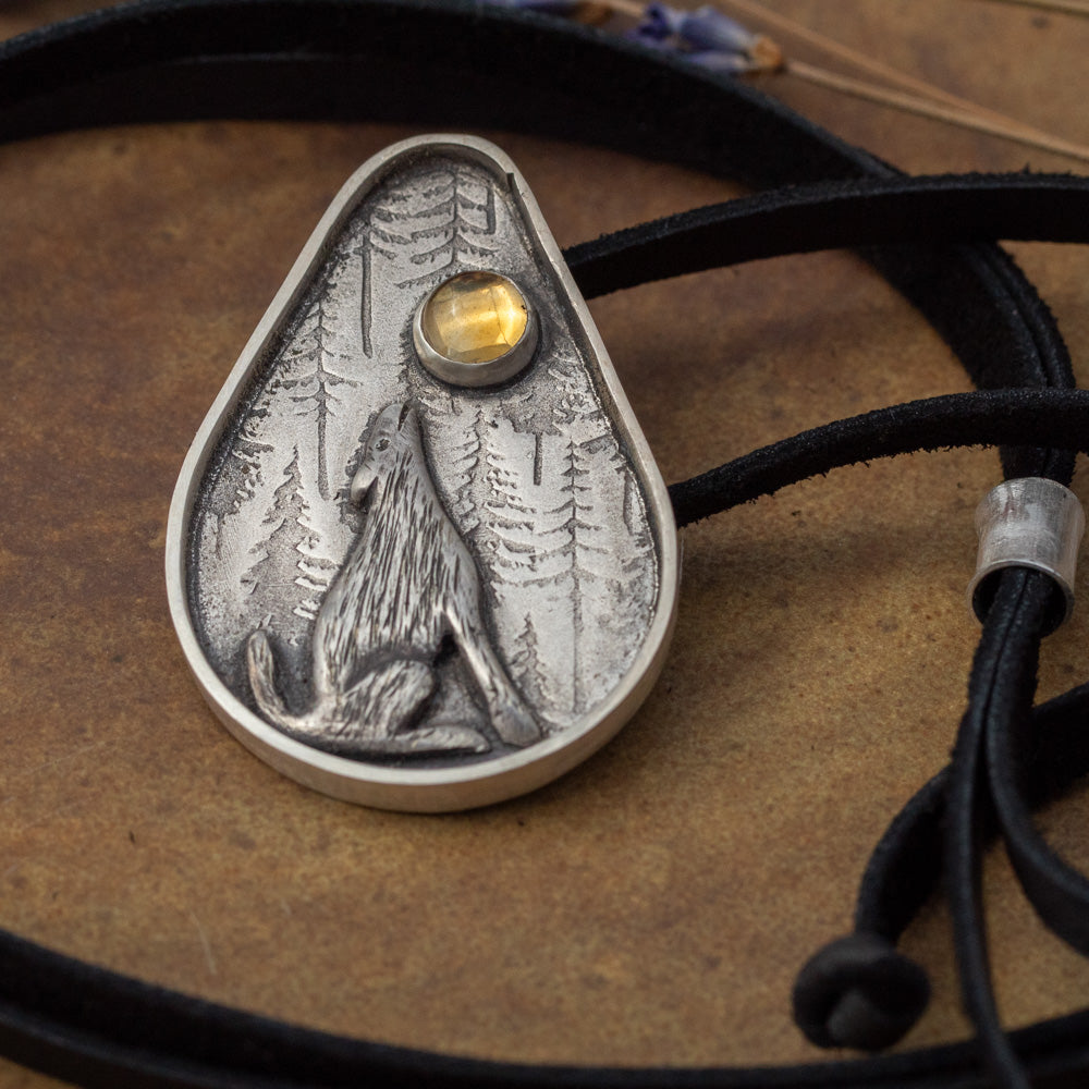 Handmade sterling silver wolf pendant with forest background and 6mm golden citrine