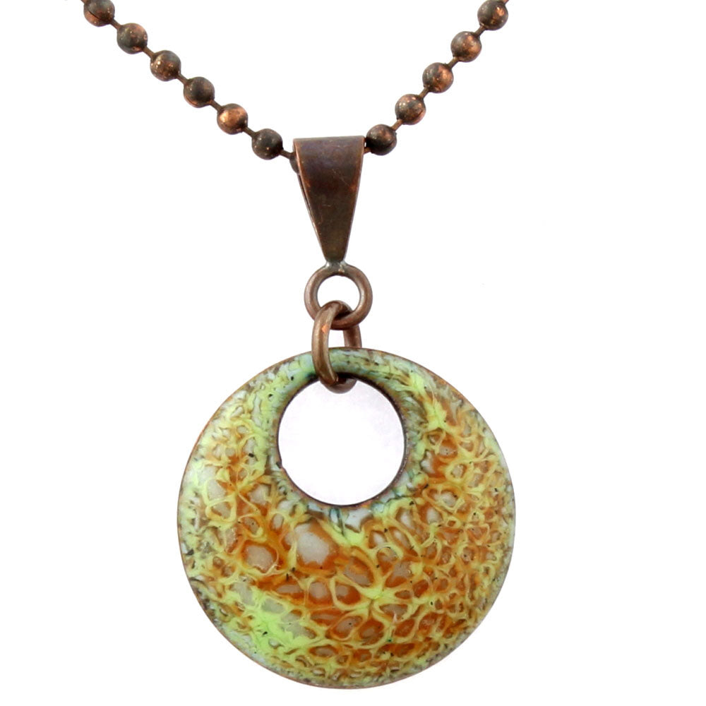 Green and amber enamel pendant with copper bail and chain, nature-inspired texture