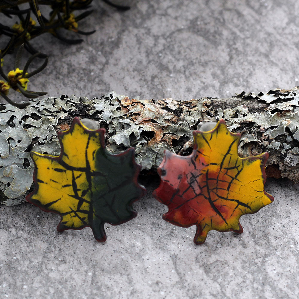 Enamel maple leaf stud earrings in assorted fall colors