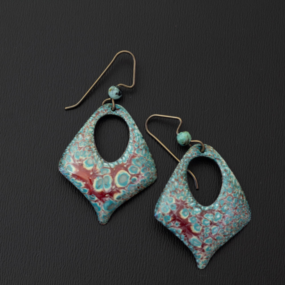 Diamond-shaped aqua and cranberry enamel earrings with open teardrop centers, handmade on copper with niobium ear wires and coordinating gemstone beads.