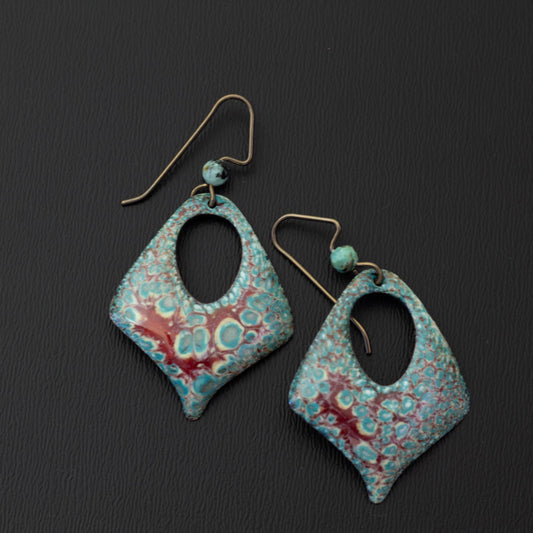 Diamond-shaped aqua and cranberry enamel earrings with open teardrop centers, handmade on copper with niobium ear wires and coordinating gemstone beads.