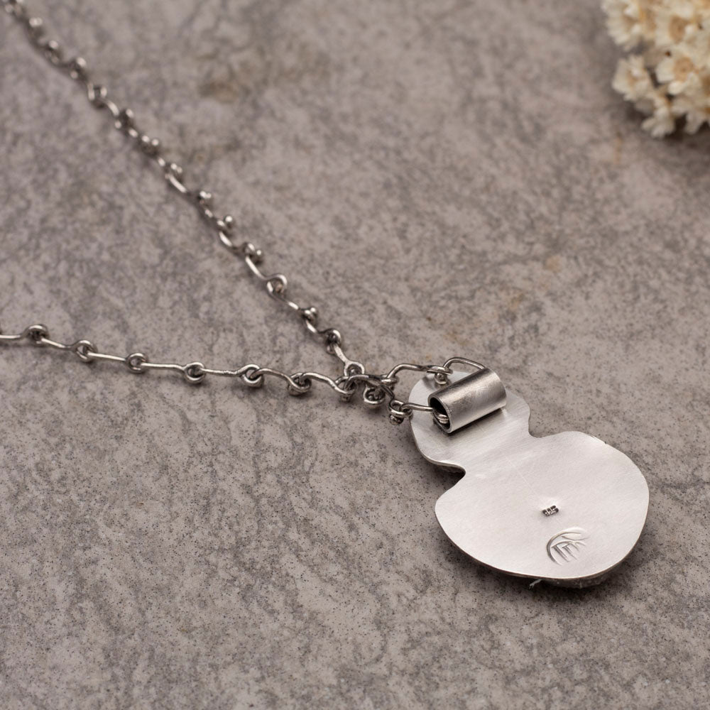 Back of sterling silver necklace with Sonoran turquoise stones and handmade chain.