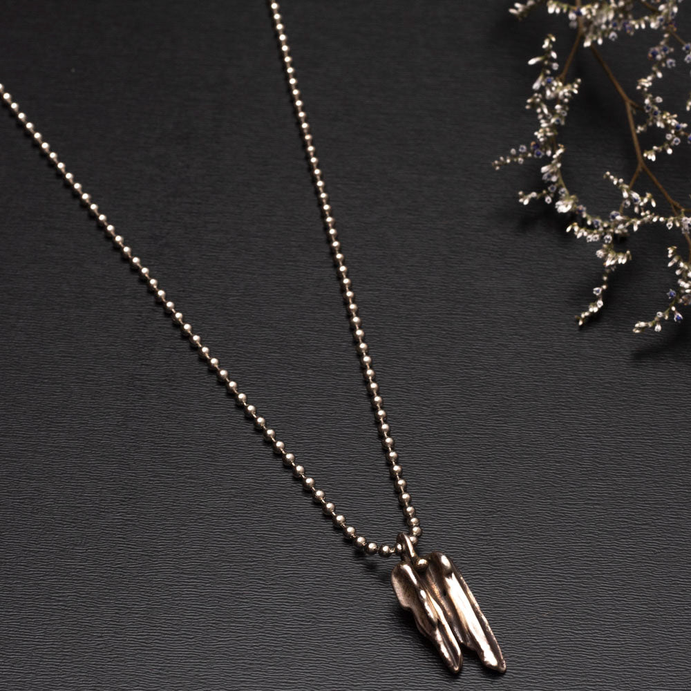 Handmade broom-cast sterling silver necklace created from recycled scrap silver, unique organic pendant on silver chain