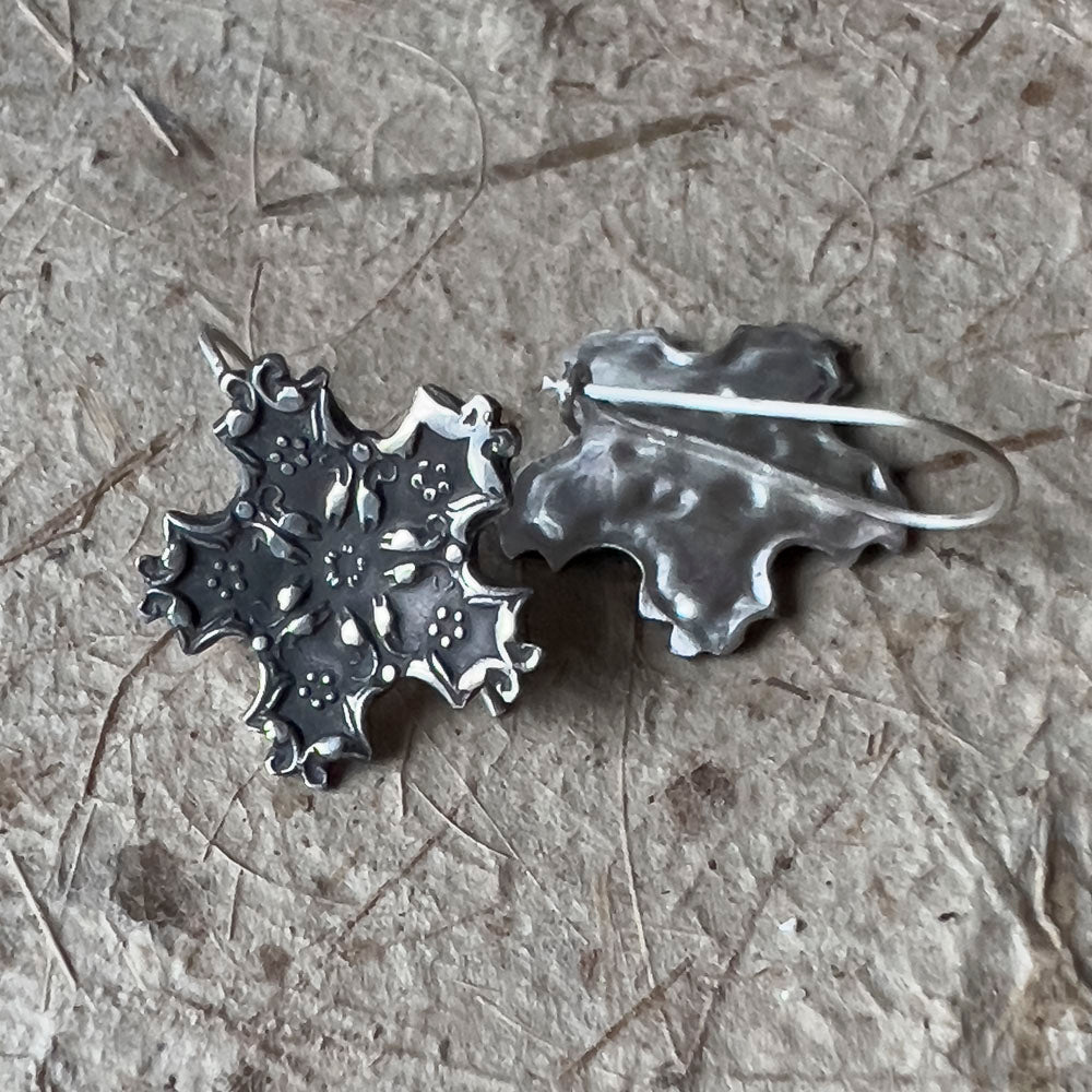 Silver snowflake earrings, front and back to show catch