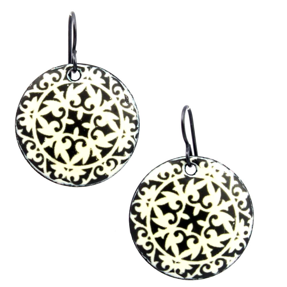 Black and ivory enamel earrings with intricate lace medallion pattern on niobium wires