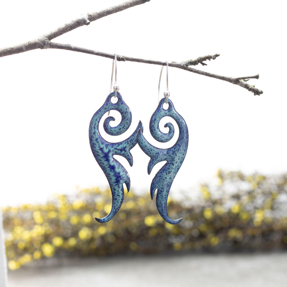 Blue enameled copper earrings with sterling silver ear wires and wave-inspired design