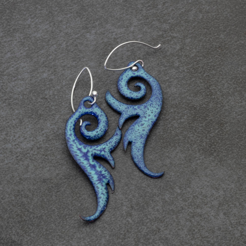 Blue enameled copper earrings with sterling silver ear wires and wave-inspired design