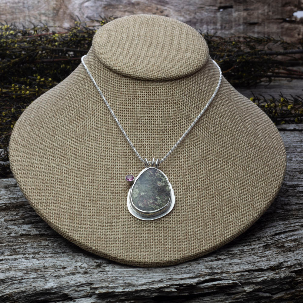 Teardrop dendritic agate pendant with pink tourmaline on sterling silver chain.