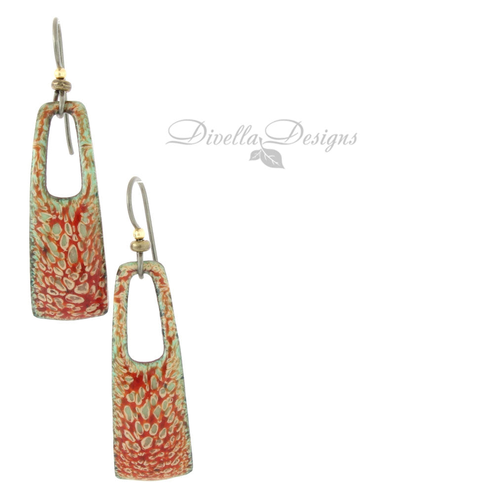 Red and green enamel earrings with organic lichen-inspired pattern and niobium ear wires
