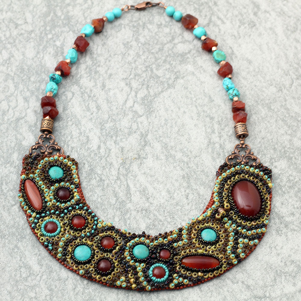 Turquoise & Carnelian Bib Necklace: Hand embroidered with genuine turquoise and carnelian stones.