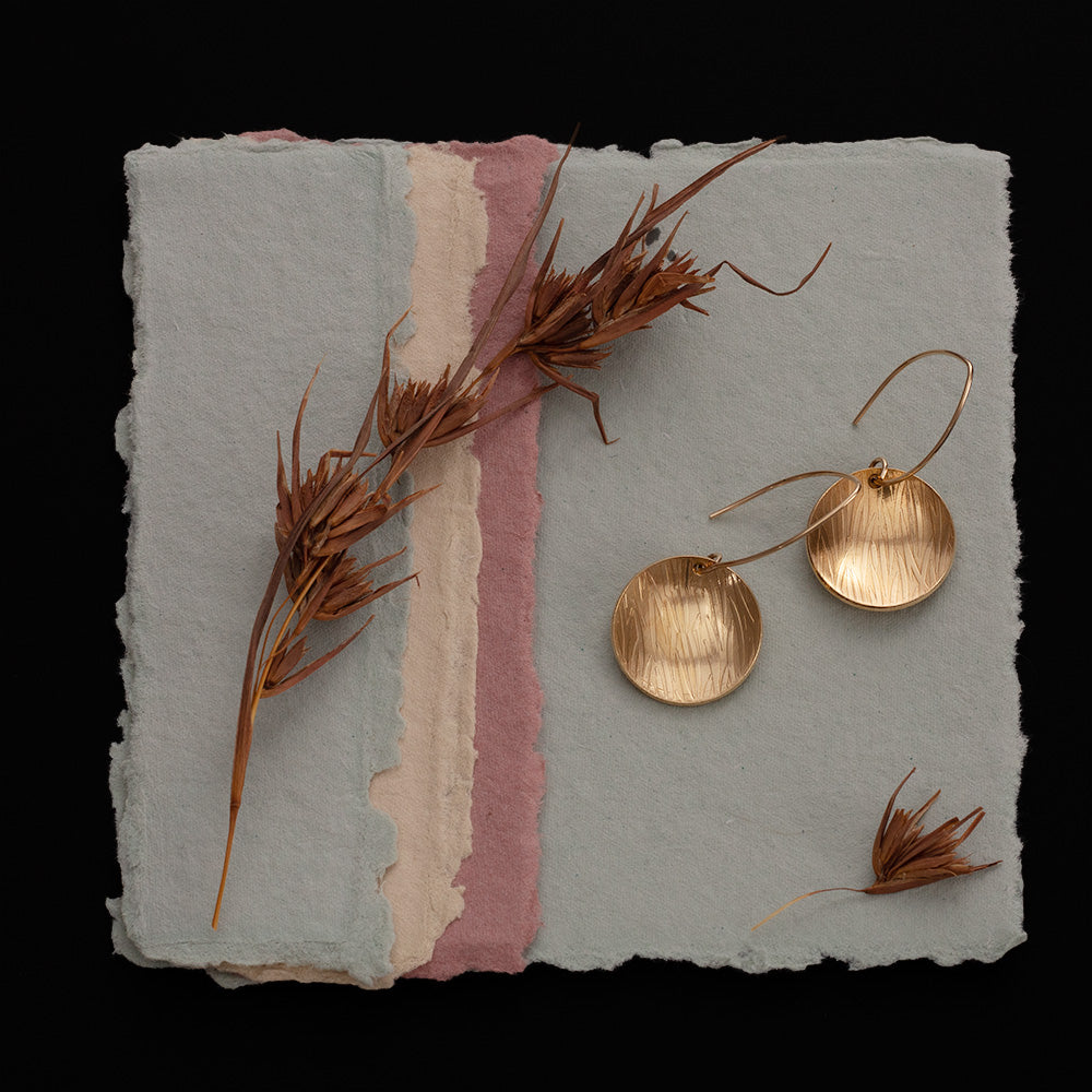 Brass disc earrings with 14k gold filled ear wires and etched texture, ¾ inch round