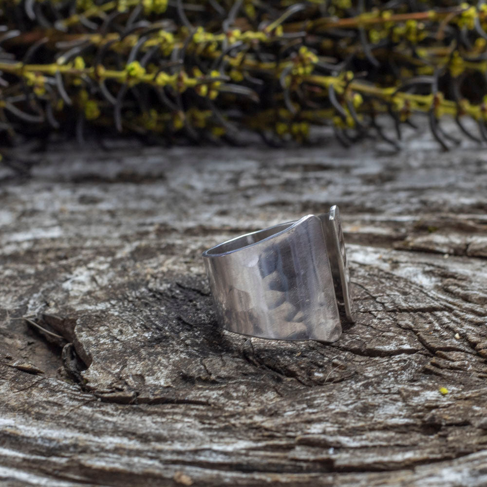 Sterling silver hammered crescent ring with tapered band, size 7.5 adjustable.