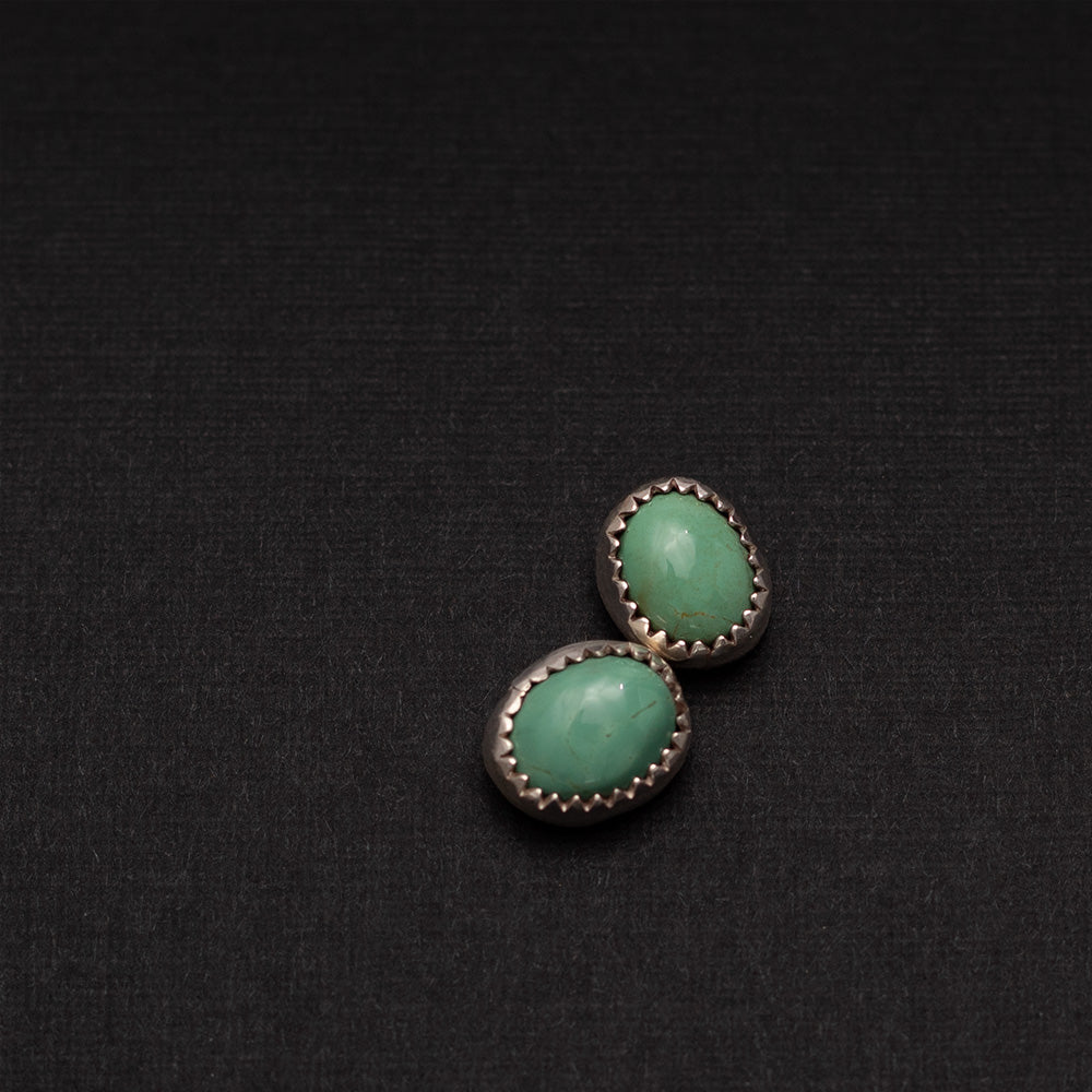 Sterling silver stud earrings with 11mm King’s Manassa turquoise stones.