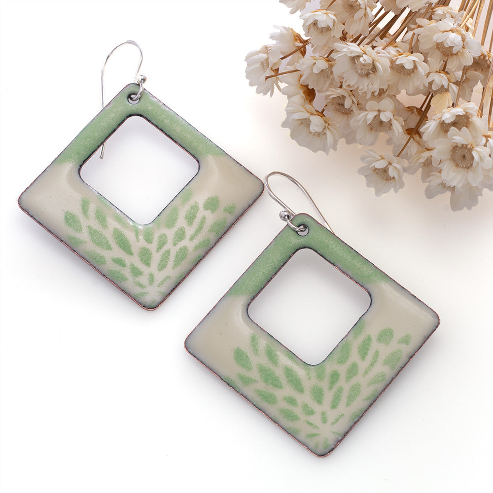 Pale green enamel square earrings with floral pattern and open window design on copper, sterling silver ear wires