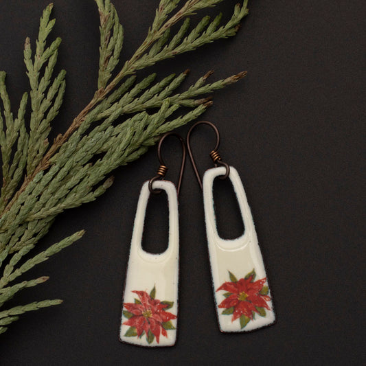 White enamel rectangle earrings with red poinsettia flowers and copper ear wires