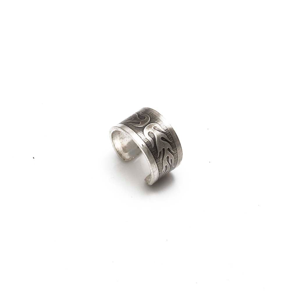 Sterling silver ear cuff with engraved flame motif and brushed finish