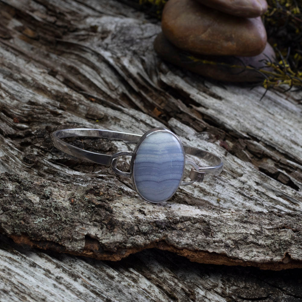 Sterling silver tension cuff bracelet with oval blue lace agate.