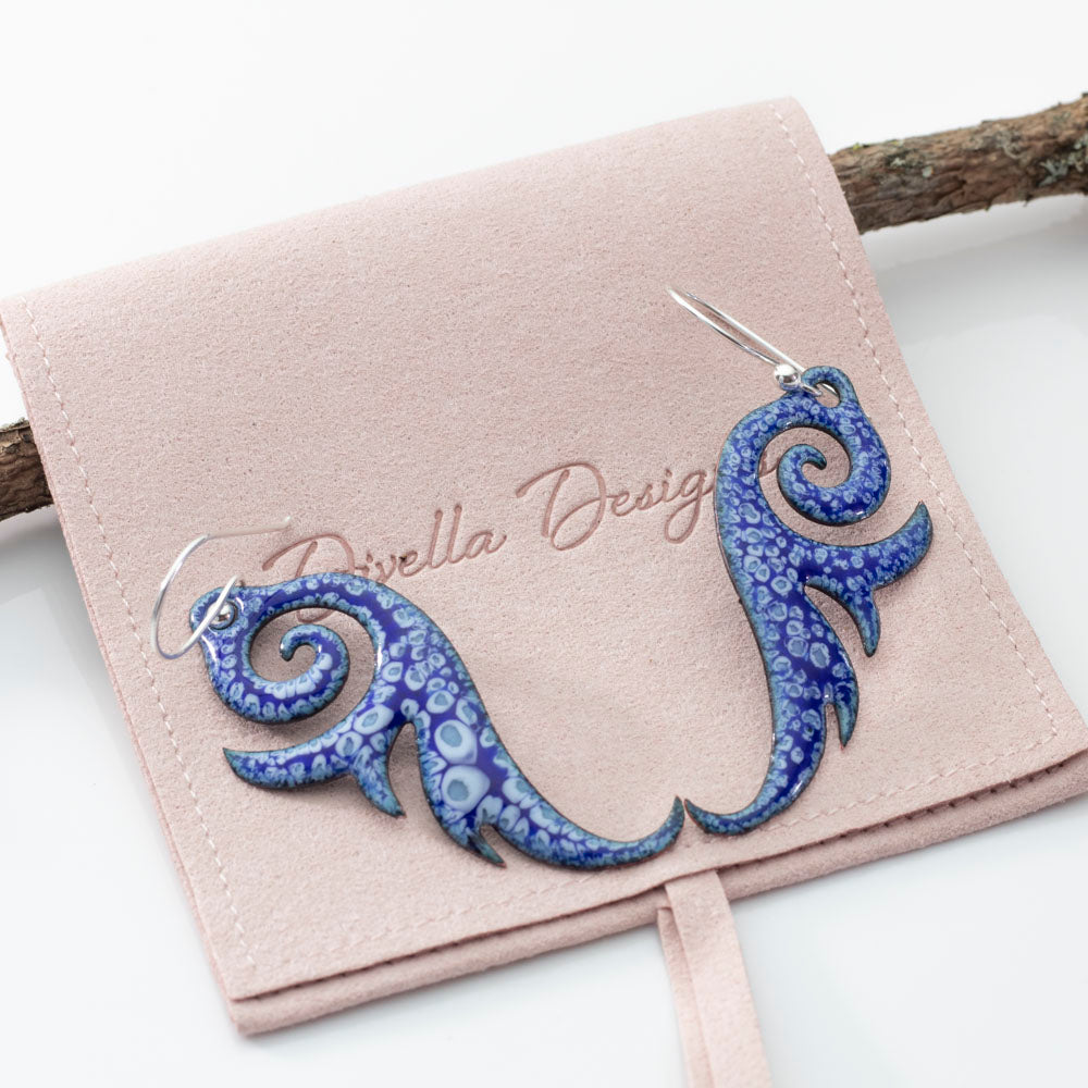 Blue enameled copper swirl earrings with niobium ear wires and ocean-inspired design