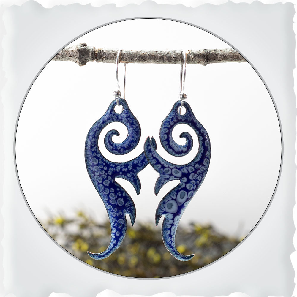 Blue enameled copper swirl earrings with niobium ear wires and ocean-inspired design.