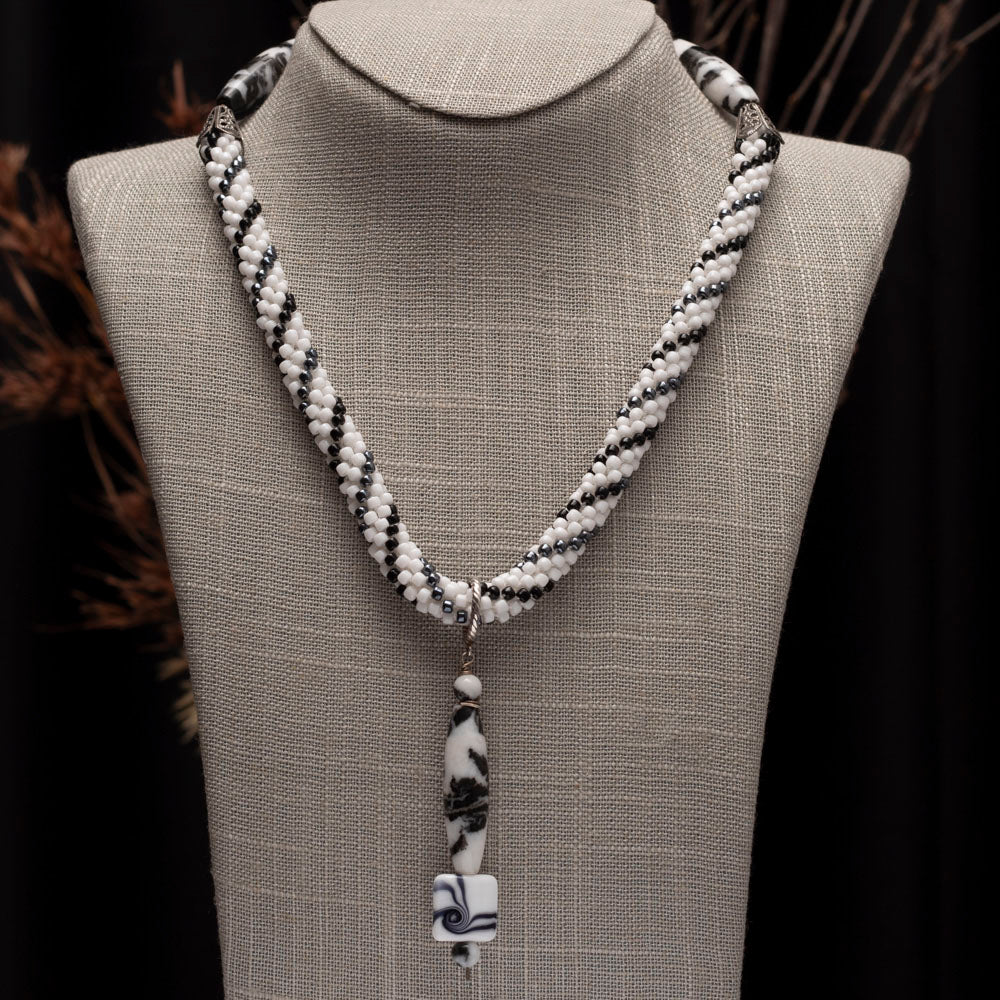 black and white bead crochet necklace with agate drop