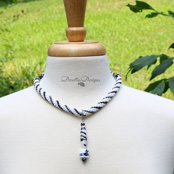black and white bead crochet necklace with agate drop
