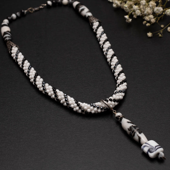 black and white bead crochet necklace with agate drop