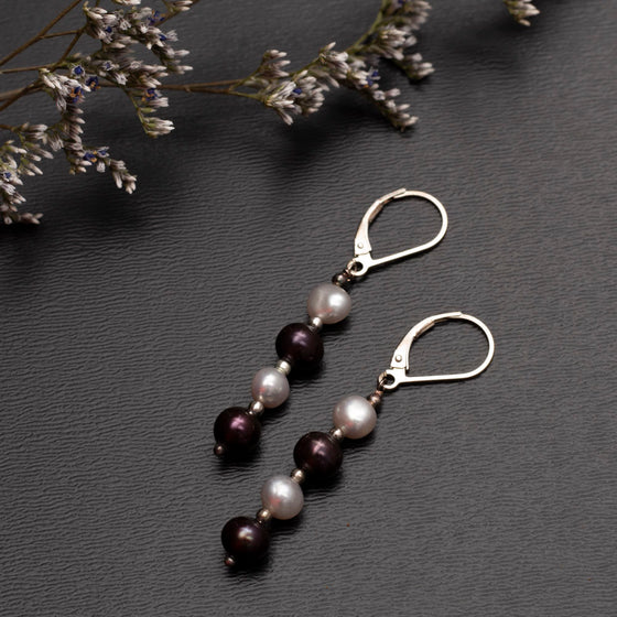 white and plum pearl earrings