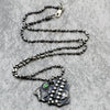 sterling silver abstract necklace with green stone