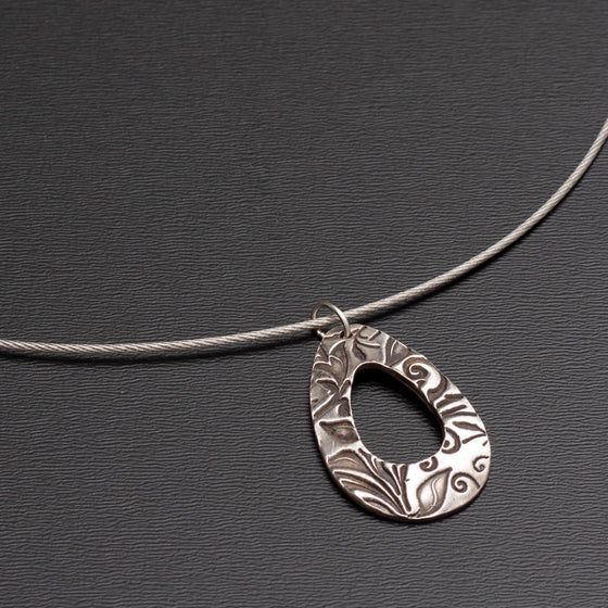 fine silver floral drop on neck wire