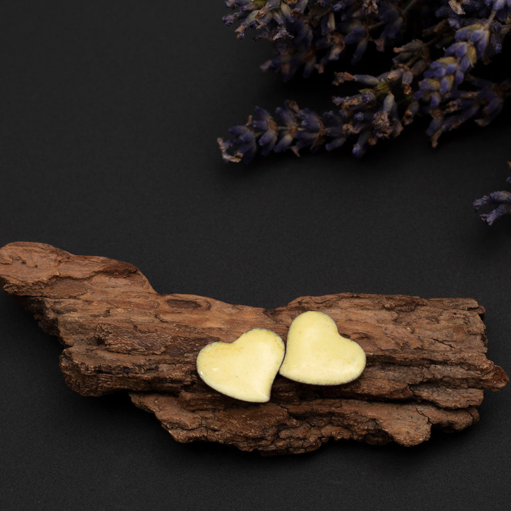 Yellow enamel heart stud earrings handmade in Vermont.