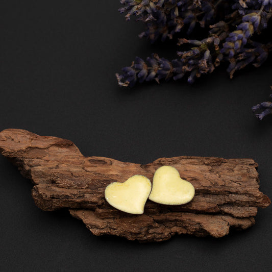Yellow enamel heart stud earrings handmade in Vermont.