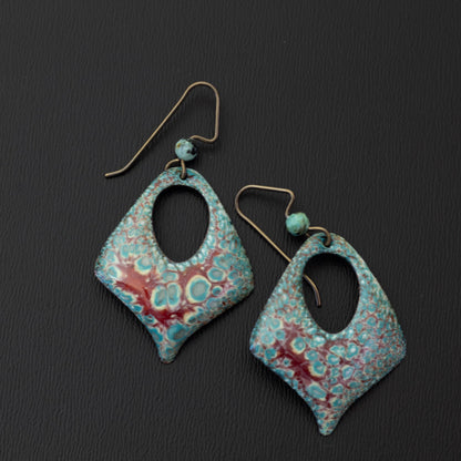 Diamond-shaped aqua and cranberry enamel earrings with open teardrop centers, handmade on copper with niobium ear wires and coordinating gemstone beads.