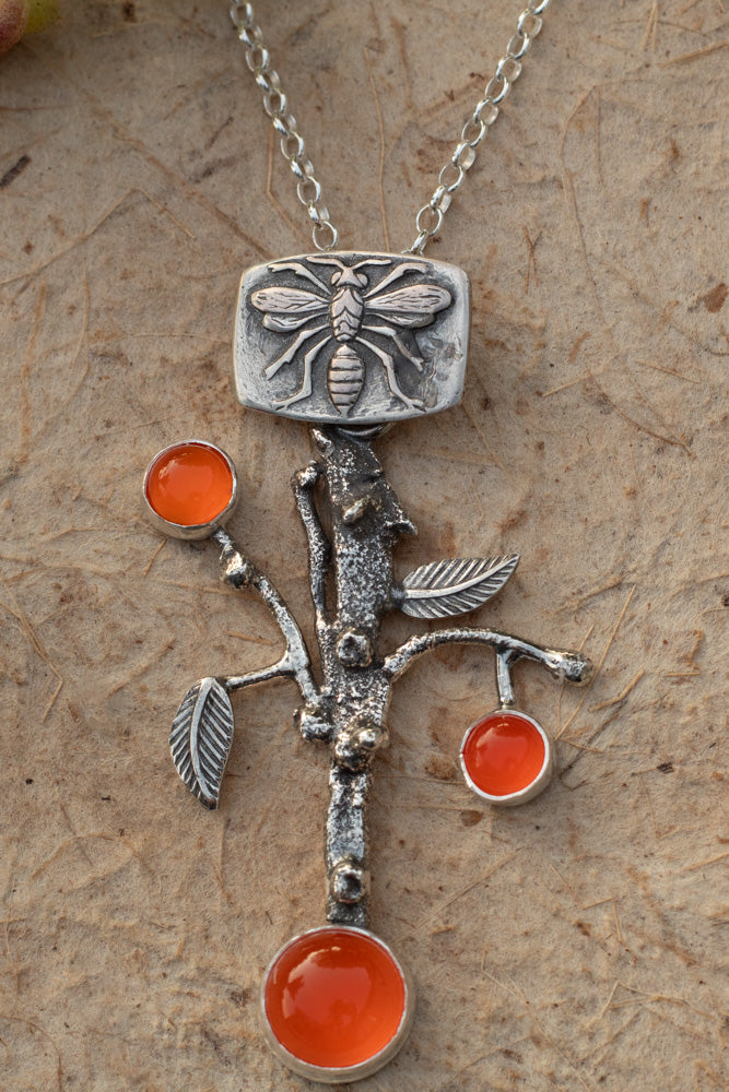Sterling silver orange branch pendant necklace with bee detail and AAA-grade carnelian stones