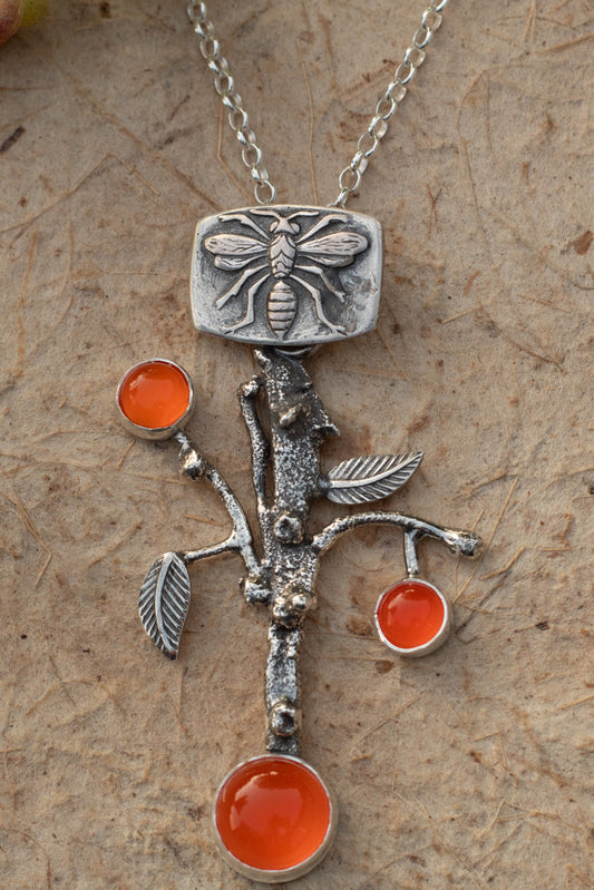 Sterling silver orange branch pendant necklace with bee detail and AAA-grade carnelian stones