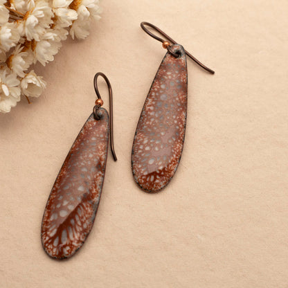 Handmade enamel earrings in rich clay brown on copper with organic speckled texture and niobium ear wires