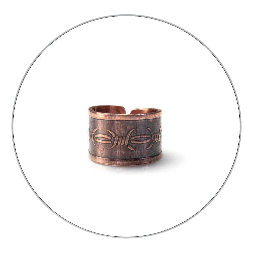 Copper ear cuff with barbed wire design