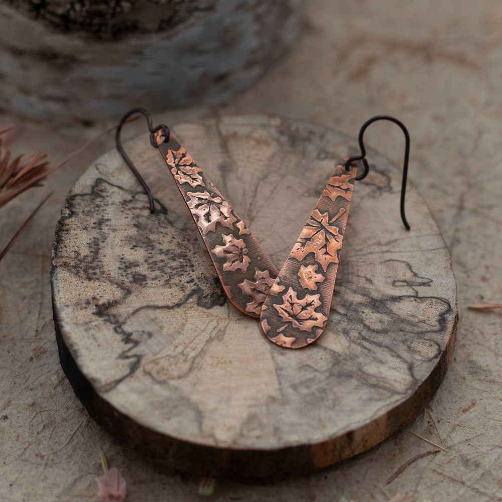 Handmade copper teardrop earrings with maple leaf impression, nature-inspired Vermont jewelry by Divella Designs