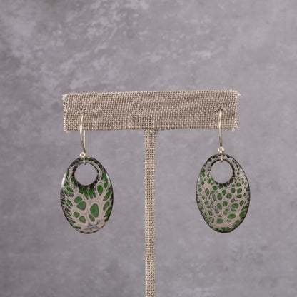 Handmade enamel teardrop dangle earrings in green and cork, nature-inspired jewelry on copper with sterling silver ear wires.