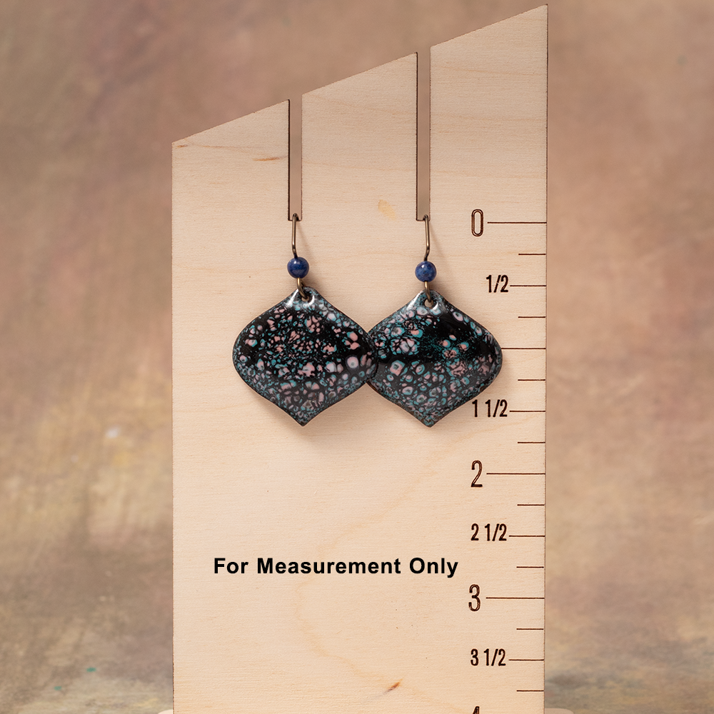Enamel petal drop earrings shown for scale with niobium ear wires.