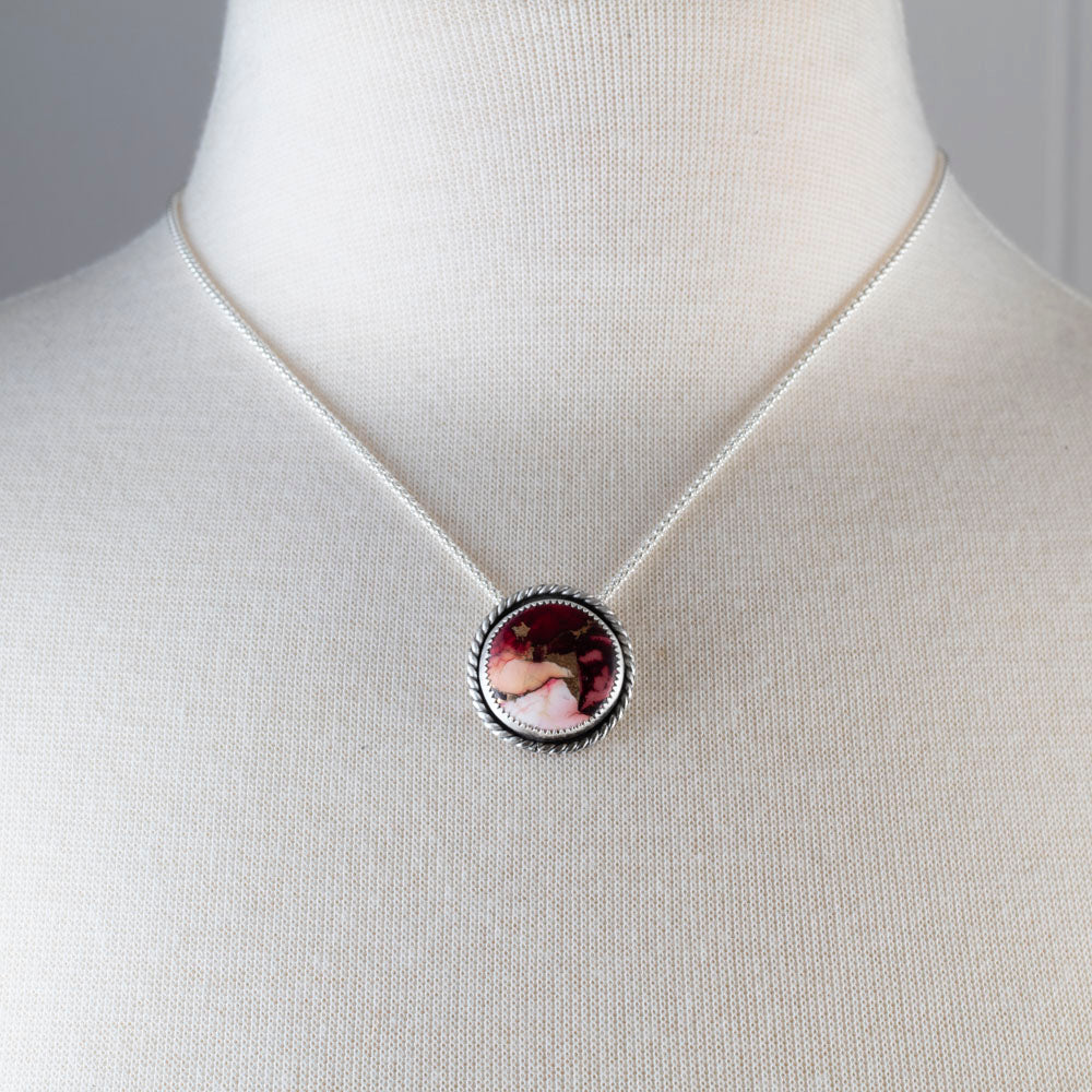 Dahlia stone sterling silver necklace with berry and blush floral-patterned stone, approximately 1 inch pendant, and 18 inch chain by Divella Designs.