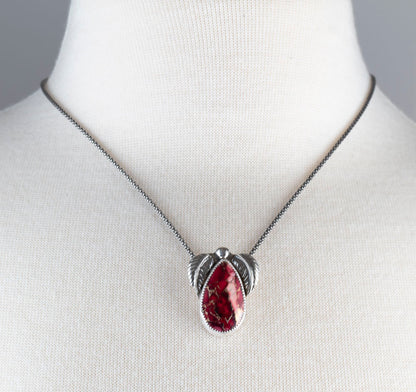 Dahlia stone sterling silver necklace with berry and blush floral-patterned stone, handmade silver setting, and sterling silver chain by Divella Designs.