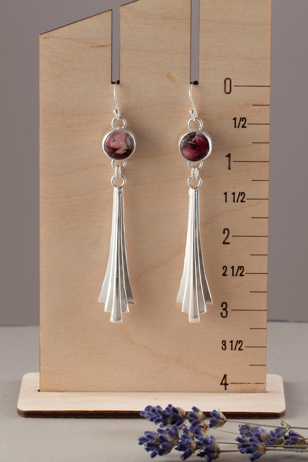 Handmade sterling silver dangle earrings with fan-shaped drops and round red and pink dahlia jasper stones, featuring floral-inspired artisan design and modern elegance.