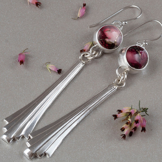 Handmade sterling silver dangle earrings with fan-shaped drops and round red and pink dahlia jasper stones, featuring floral-inspired artisan design and modern elegance.