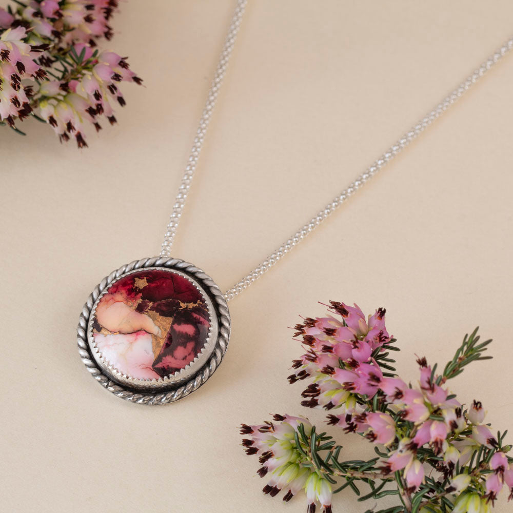 Dahlia stone sterling silver necklace with berry and blush floral-patterned stone, approximately 1 inch pendant, and 18 inch chain by Divella Designs.