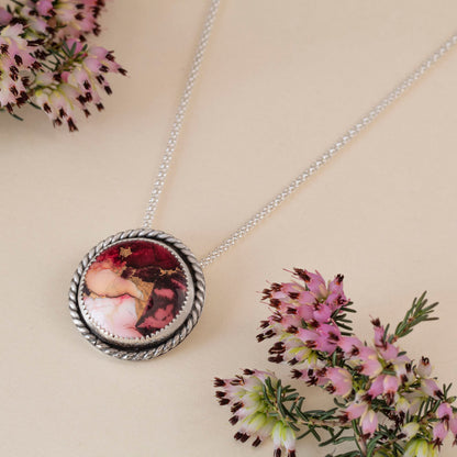 Dahlia stone sterling silver necklace with berry and blush floral-patterned stone, approximately 1 inch pendant, and 18 inch chain by Divella Designs.