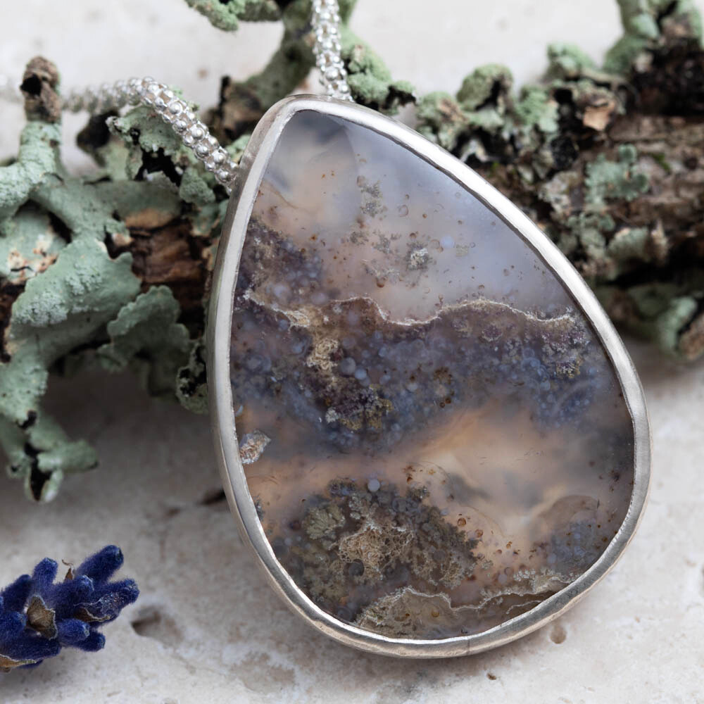 Dendritic agate sterling silver necklace with 1 by 1 2/5 inch pendant and 18 inch chain, handmade by Divella Designs in Vermont.