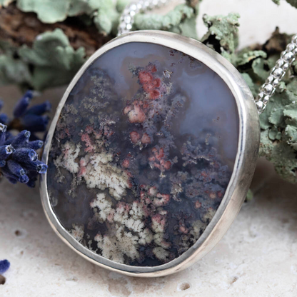 Dendritic agate sterling silver necklace with mossy woodland pattern, 1 1/8 x 1 1/4 inch pendant, and 18 inch sterling silver chain by Divella Designs.