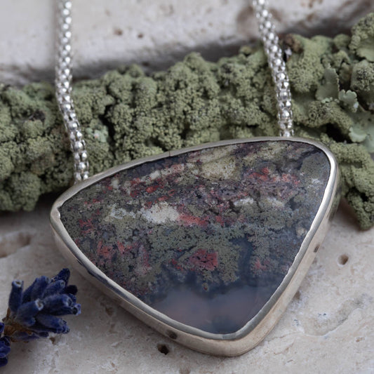Dendritic agate sterling silver necklace with 1 by 1 2/5 inch pendant and 18 inch chain, handmade by Divella Designs in Vermont.